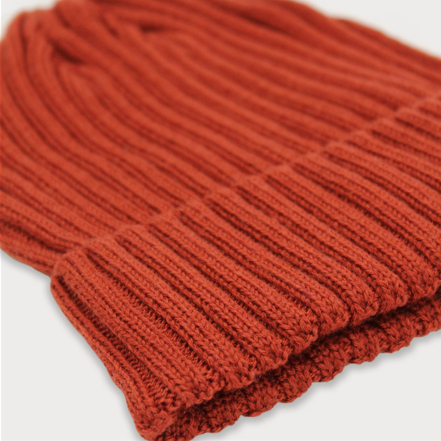 Close-up image of the Tucker Beanie in Red Brick